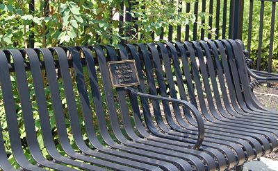 black iron garden bench, with memorial plate, In Memory of Betty Brown from Family and Friends